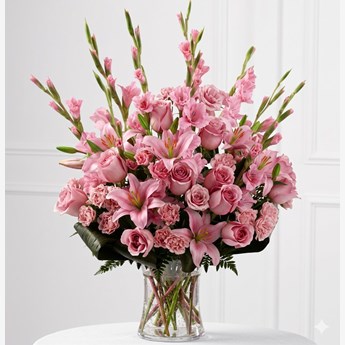 Vase with 5 Pink Lilies , 10 Pink Gladioli , 10 Pink Roses & 10 Pink Carnations