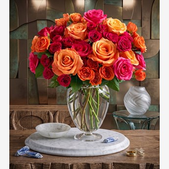 60 Orange and Pink Roses in a Vase